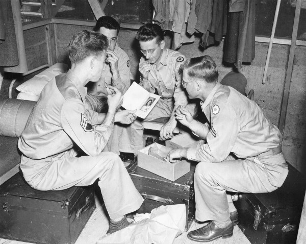 Soldiers enjoy a package of cookies